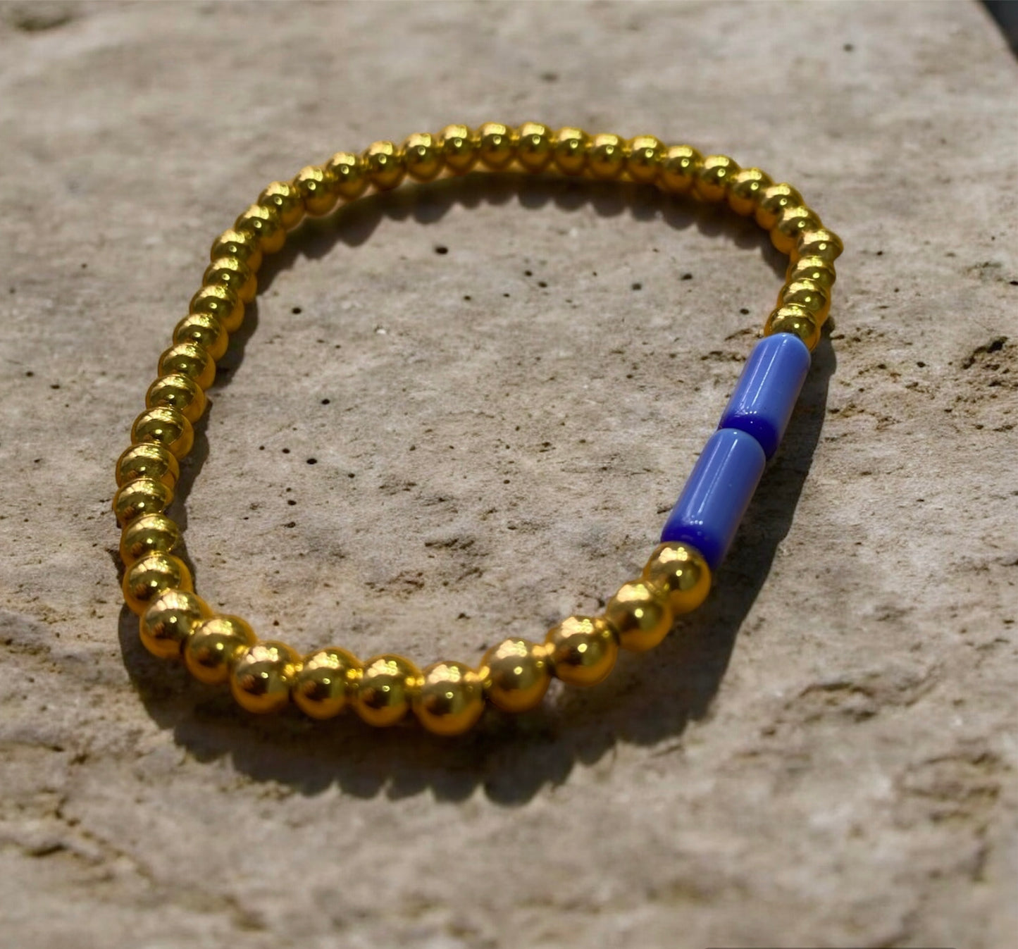 Pulsera baño de oro y azul